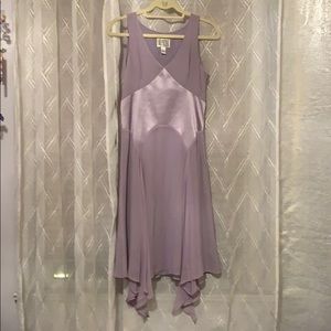 Sleeveless party dress with handkerchief hem